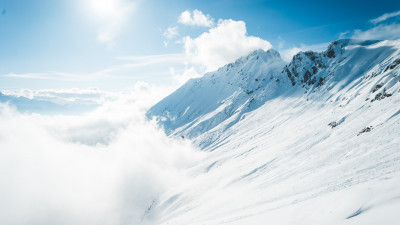 Mountains full of snow and blue sky