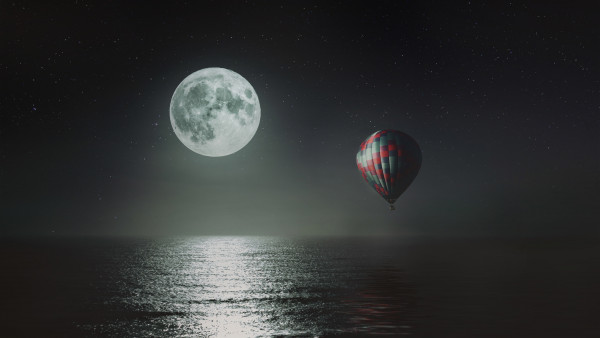 Hot air balloon over the night sky