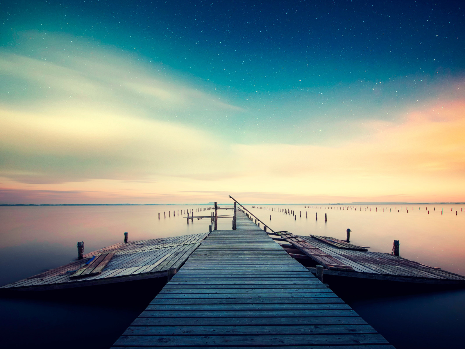 Admiring the night sky on the lake promenade wallpaper 1600x1200